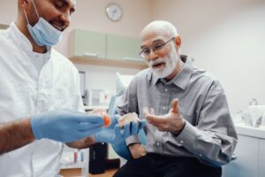 Learn which is better, dental implants vs. partials
